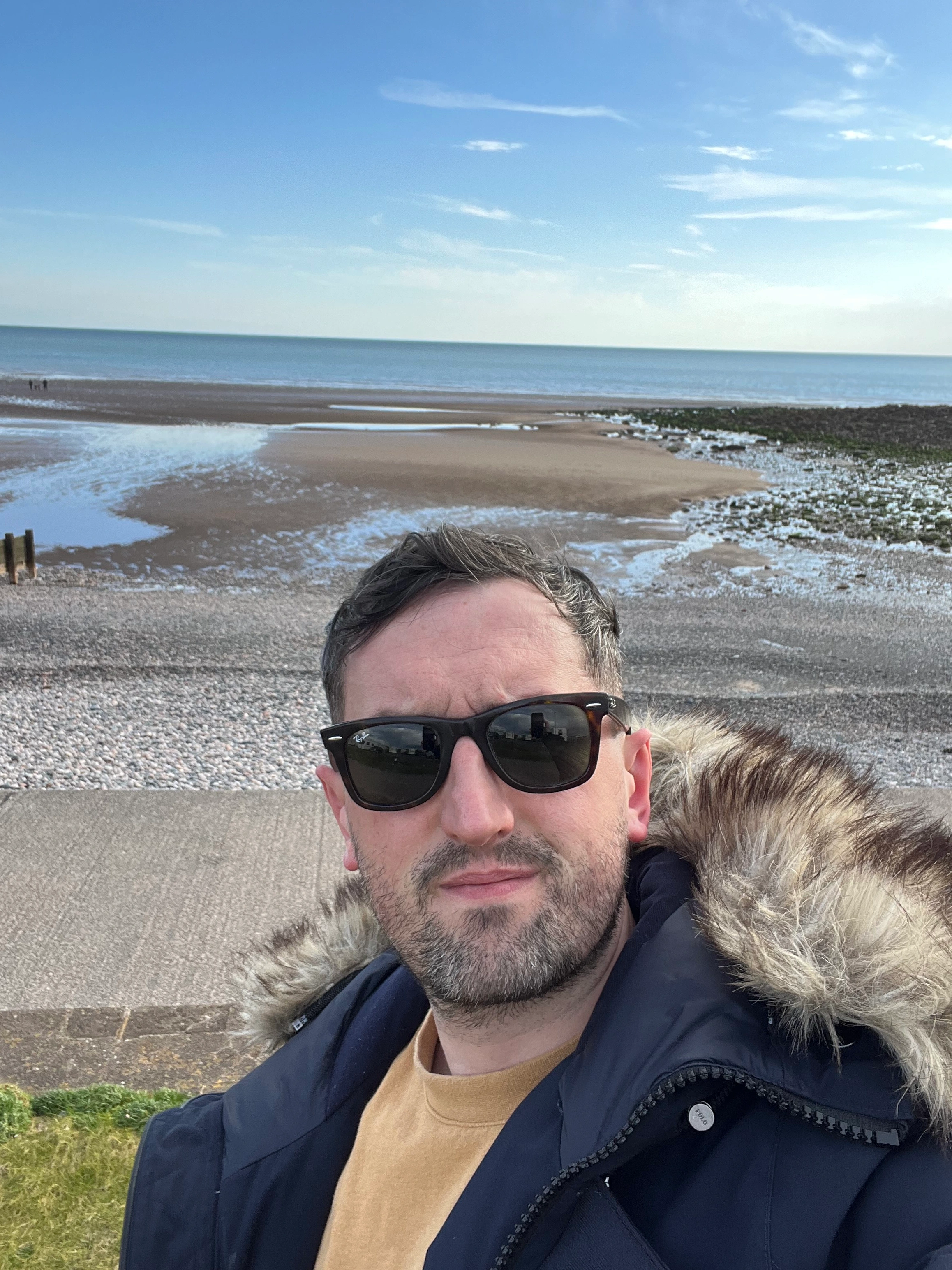 Profile of me on beach in Norfolk